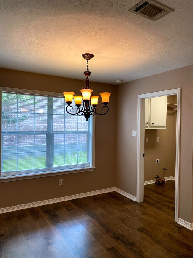 Building Photo - FABULOUS THREE BEDROOM HOME WITH LARGE DECK, FIREPLACE AND FLEX ROOM