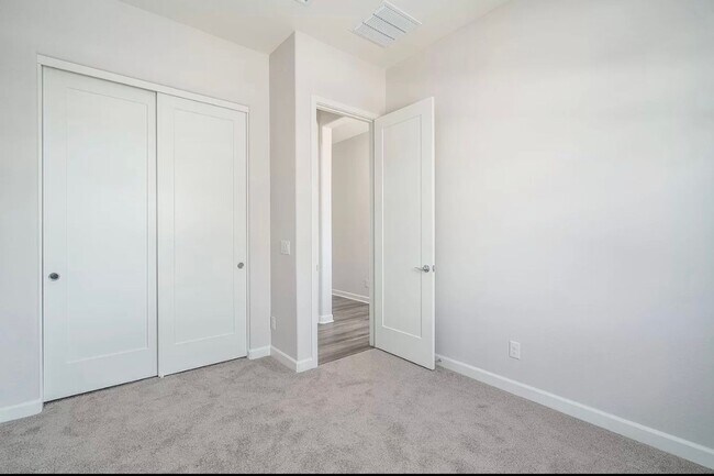 Building Photo - Stunning 4 Bedroom/3 Bath Single Level Home In Estrella Mountain Ranch Community! Newly Built Home!