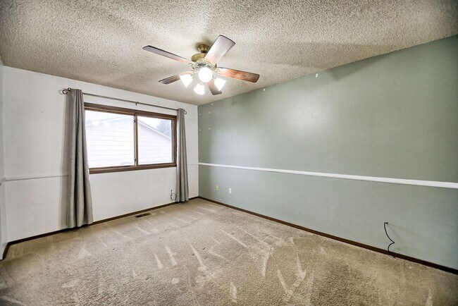 Building Photo - 4-Bedroom Home Near CSU | Fenced Yard & 2-Car Garage