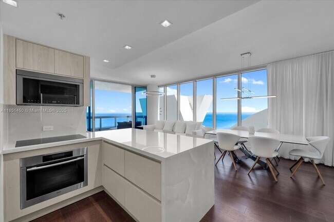 Building Photo - 6899 Collins Ave