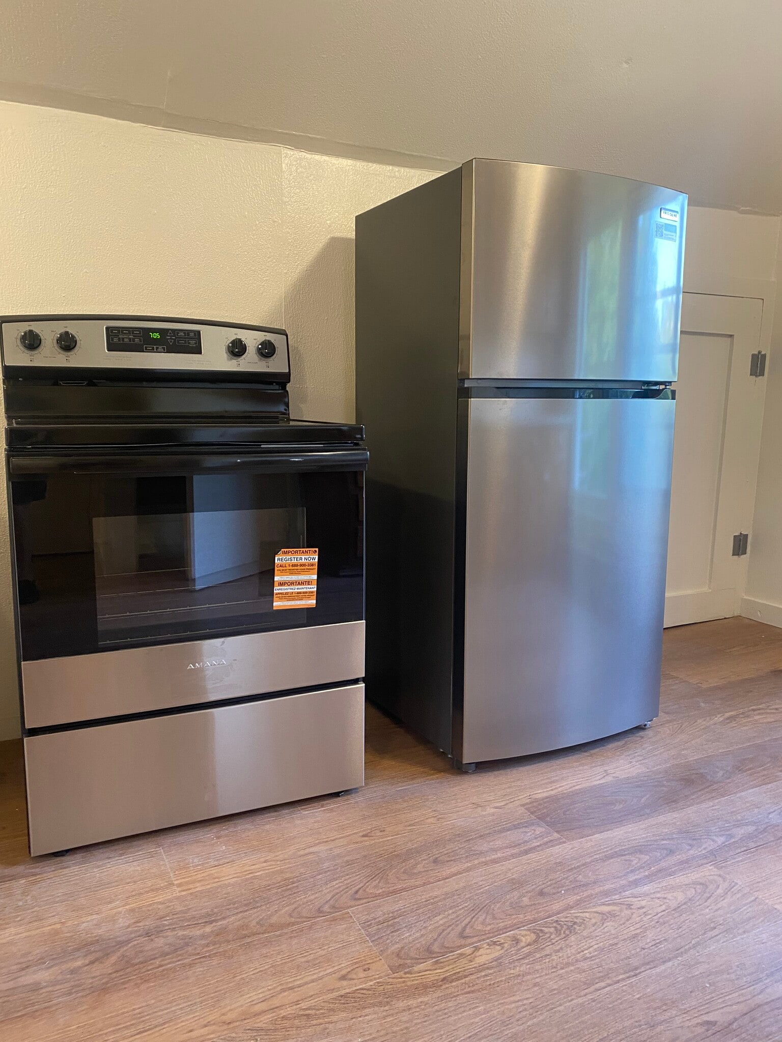 stainless electric stove and refrigerator - 2550 N 45th St