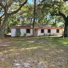 Building Photo - Corner Lot Charm: Spacious 4 Bed on Corner...