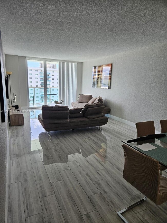 Building Photo - 19370 Collins Ave