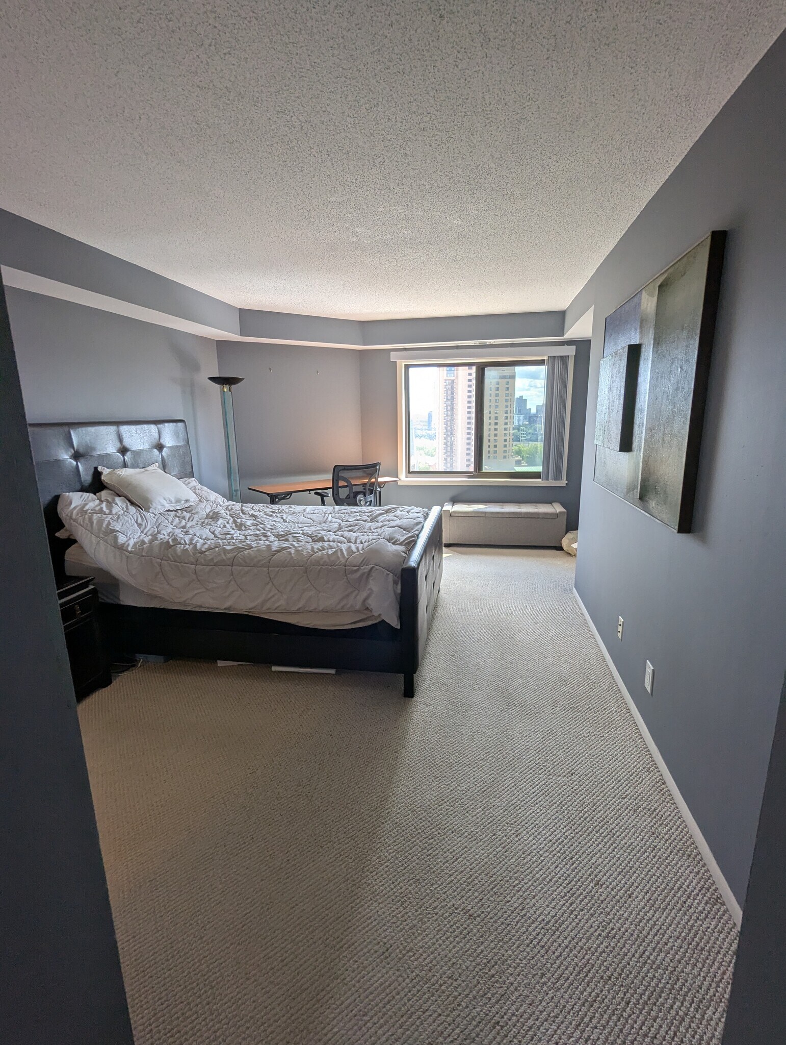 Large bedroom with desk. - 110 1st Ave NE