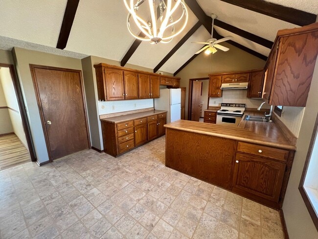 Building Photo - Spacious 3BR Home with 3-Car Garage & Big Backyard