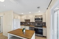 Building Photo - Charming 2-Bedroom home with Front and Rear Balconies