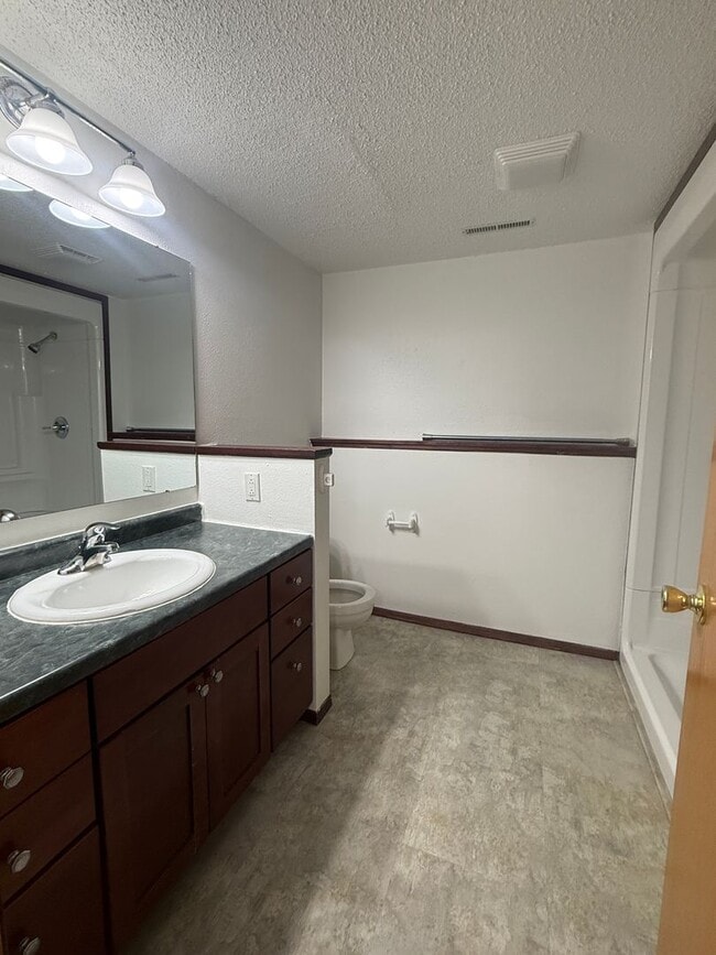 Building Photo - Spacious 3BR Home in Legacy School District with 3 Living Areas & 2-Stall Garage