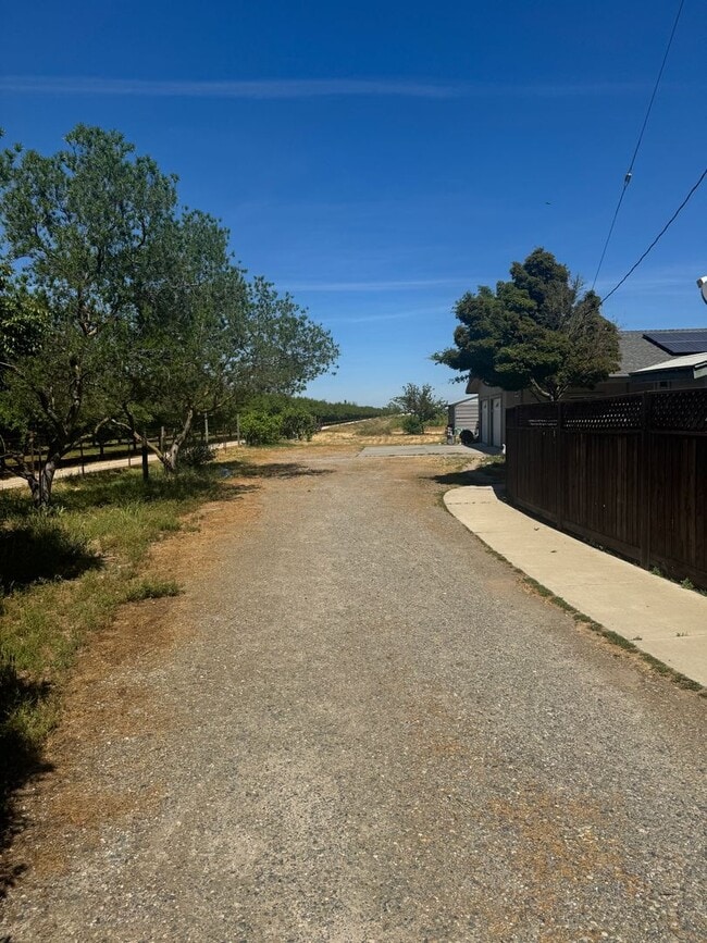 Building Photo - 4 Bed / 2 Bath Country Home – Solar + Move-In Ready