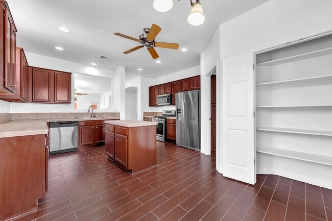 Building Photo - Inviting 3-Bed, 2-Bath Home in Gated Commu...