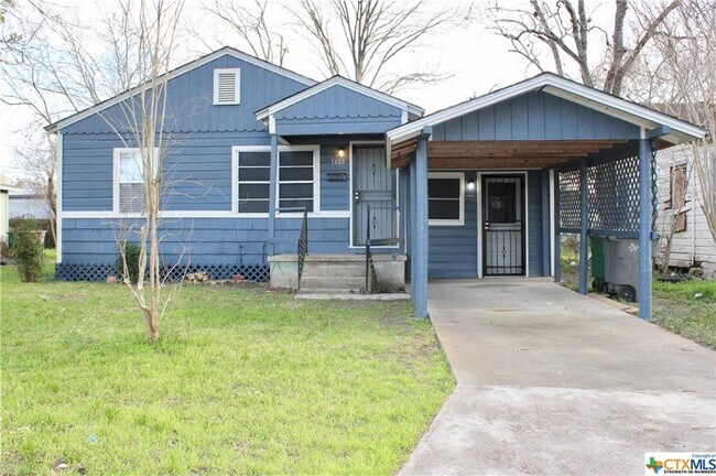 Building Photo - 1409 E Mistletoe Ave