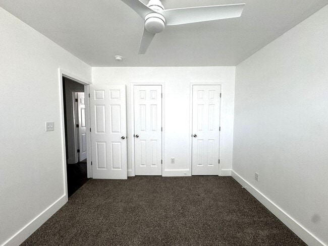 Building Photo - Completely Remodeled 2BR/1.5BA Townhome – City Convenience!