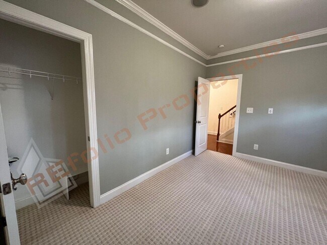 Building Photo - Elegant 3 Story 3 Bedroom Formal Model Tow...