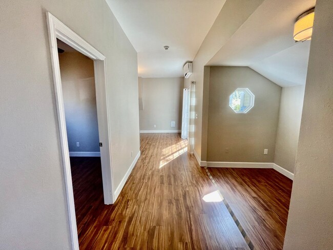 Building Photo - Prime Location! Modern 2BD/1 BA with A/C & EV Charging Steps from Mississippi