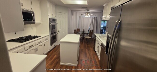 Building Photo - 3 Bed | 2 Bath Home with Office, Sunroom, Outdoor Kitchen & Backyard Oasis