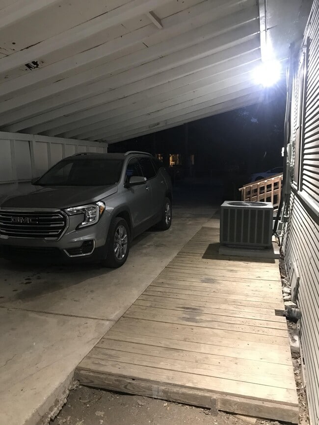 Gated yard with security lighting - 1105 Essex St