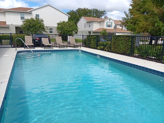 Building Photo - Stunning townhome in gated community near ...