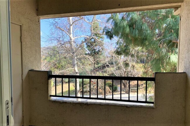 Building Photo - Sabre Springs Top Floor Condo with Carport