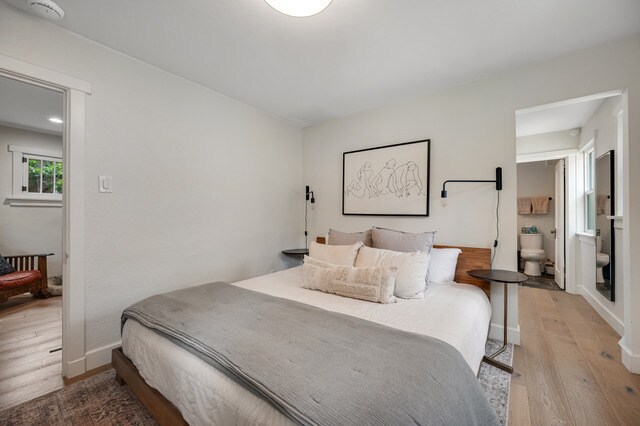 Primary bedroom (first floor) - pictured is a king size bed - 1131 S Elizabeth St