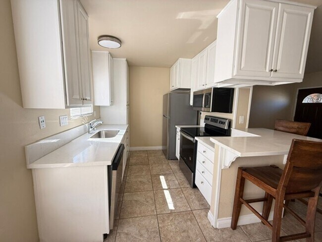 Building Photo - Charming 1 Bedroom Condo in Gated Chula Vista Community with Pool and Parking!