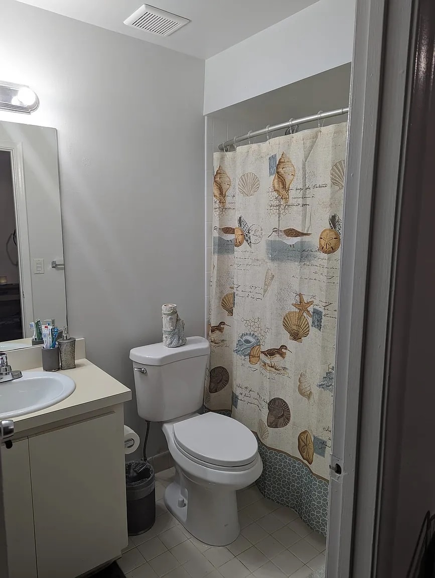 Primary bathroom - shower and tub - 13928 SW 52nd Ln
