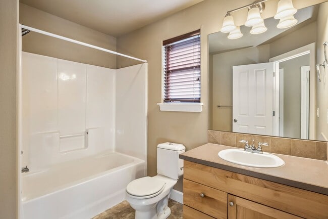 Building Photo - Spacious 4-Bedroom Home with New Paint & Carpet, Fenced Yard