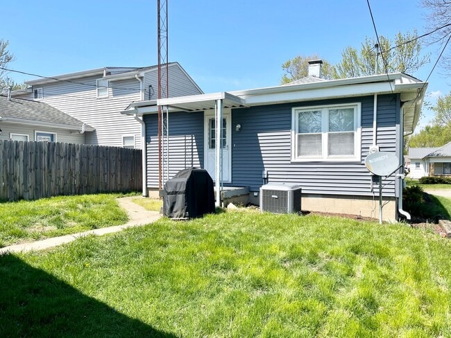 Building Photo - East Side Gem – Spacious 2BR Home with 2 C...