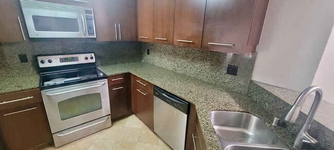 Building Photo - Upgraded, 2 dual primary bedrooms with bat...