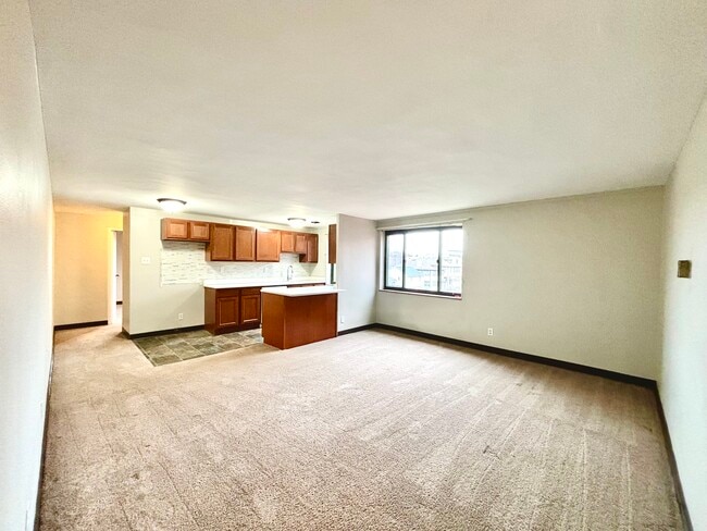 Carpeted 1 Bedroom - Living Room - Fieldbrook Apartments