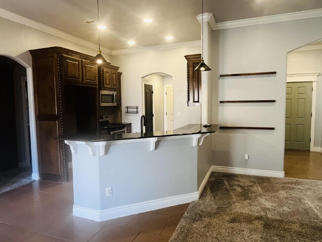 Building Photo - Charming 4-Bed, 2-Bath Home in Yukon - Gated Community in Mustang Public School District!