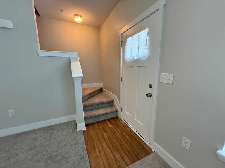 The upstairs leads to two bedrooms, each with an ensuite bath and walk-in closets. - 3010 Bellflower Cir