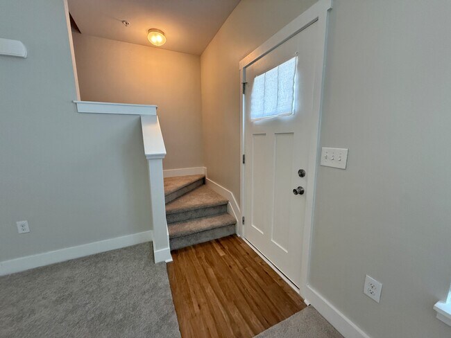 The upstairs leads to two bedrooms, each with an ensuite bath and walk-in closets. - 3010 Bellflower Cir