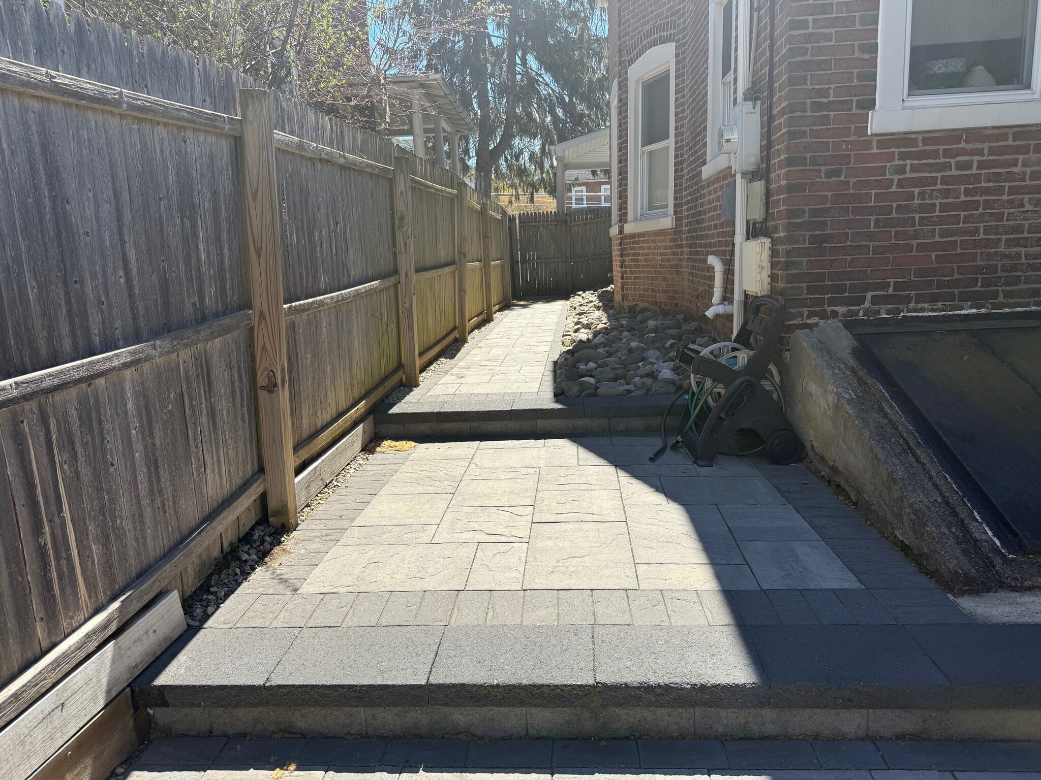 fenced in walkway to your backyard oasis - 130 Simpson Rd