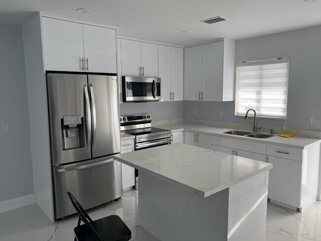 Building Photo - "Charming 2-Bed Retreat Waterfront W/Pool ...
