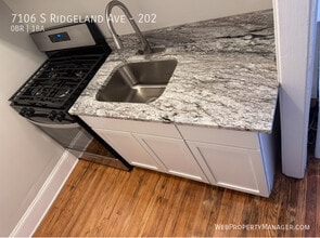 Building Photo - 7106 S Ridgeland Ave