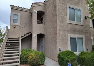Building Photo - SPACIOUS FIRST-FLOOR CONDO LOCATED IN A GATED COMMUNITY!