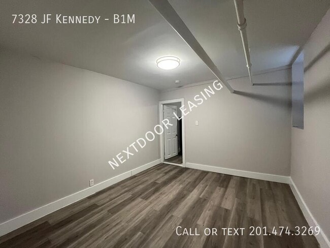 Building Photo - 7328 John F. Kennedy Blvd