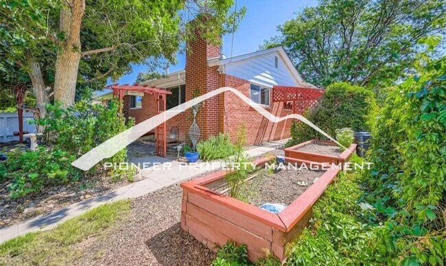 Building Photo - Beautifully Renovated Ranch Home with 2 Car Garage, AC, Garden Space & Prime Location