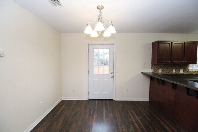 Building Photo - Spacious 4BR Home in Robin's Ridge with Soaring Ceilings, Guest Suite & Two-Car Garage