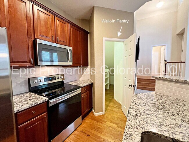 Building Photo - Stunning Saddle Rock East Townhouse | 2 BD + Loft | 2.5 BA | 2-Car Garage