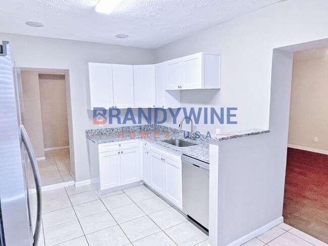 Building Photo - Happy New Year! Move in by 2/15 and get Ma...