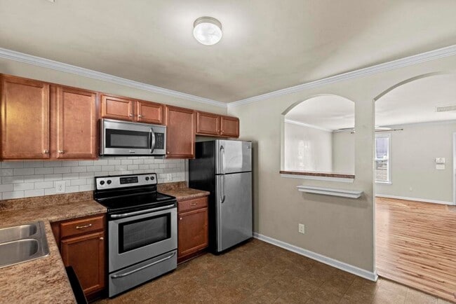 Building Photo - End Unit with Lots of Upgrades!