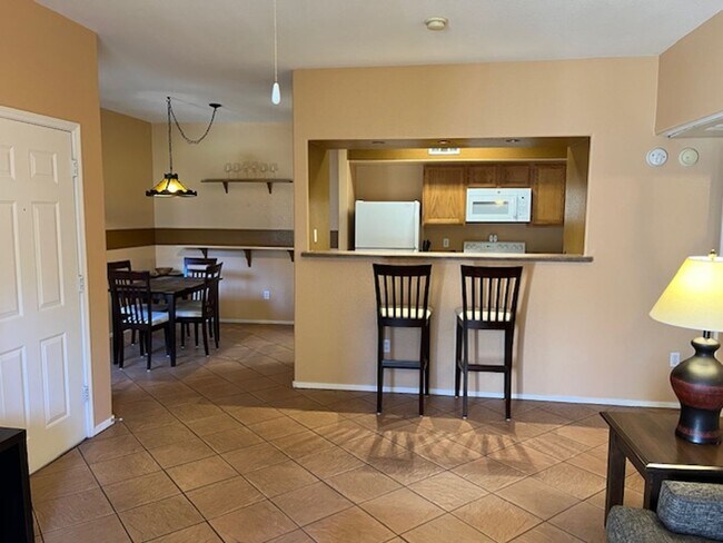 Building Photo - Fully Furnished 1st Floor Condo overlooking Park Area  in Gated Tuscano Community – Southwest Las...