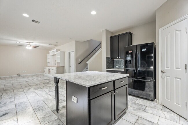 Building Photo - "Charming 4-Bed Home with Elegant Granite Touches & 2.5 Baths!"