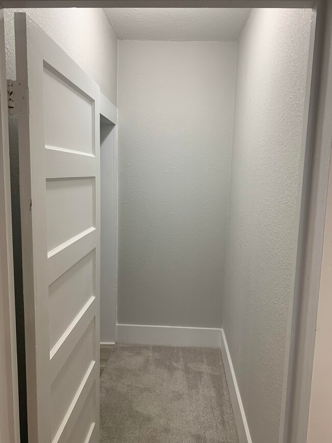 downstairs hallway - 200 W Caroline St