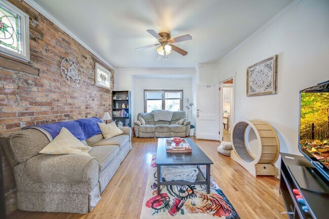 Building Photo - Charming 5-Bedroom Home with Exposed Brick and Modern Upgrades