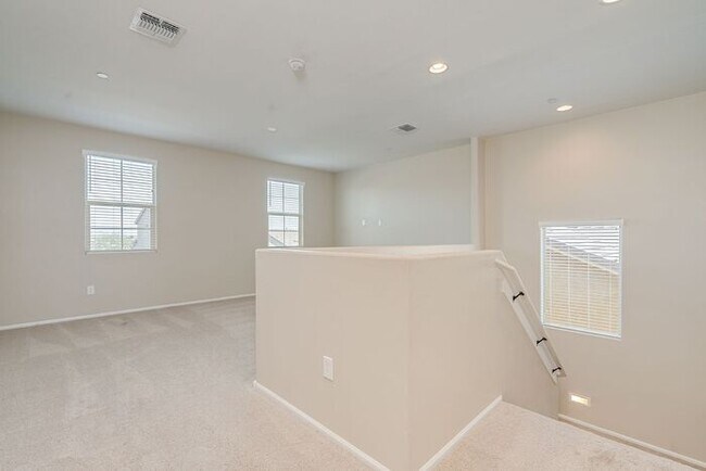 Building Photo - Amazing 4BR 2.5BA Home w/ 3-Car Tandem Garage • Pool Access • Yard w/ Fire Pit in Saguaro Trails