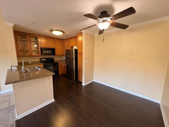 Building Photo - 1BR Condo with Private Balcony, Central A/C & Community Amenities in Corona