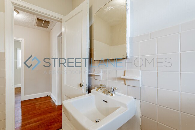 Building Photo - REDUCED! - NOW OFFERING HALF OFF FIRST FUL...