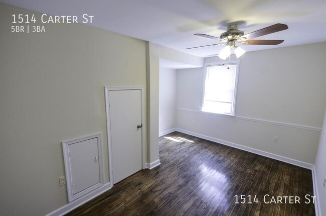 Building Photo - Updated spacious 5-bed with a fenced-in yard!