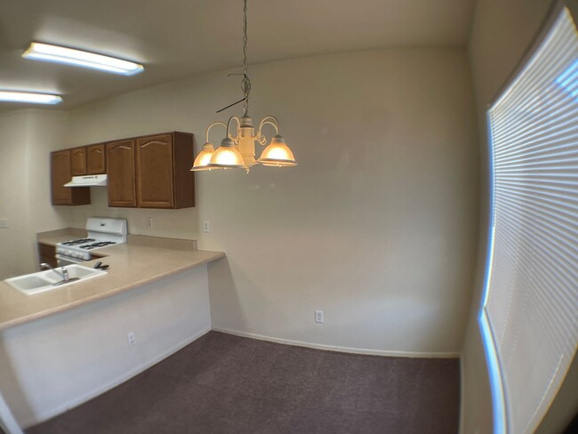 Building Photo - AVAILABLE NOW! Spacious 3-bedroom Townhous...